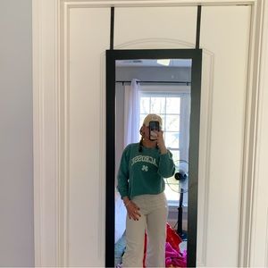 Super cute briefly worn crewneck, says Lacrosse with a four leaf clover